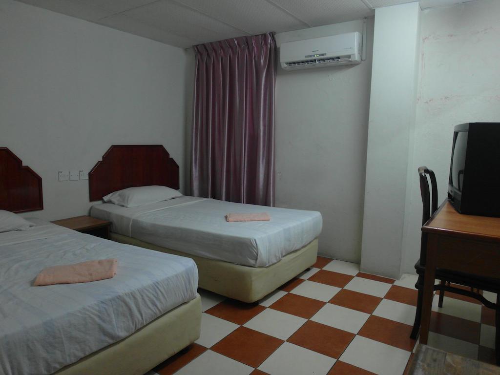 Silverwood Inn Miri Zimmer foto